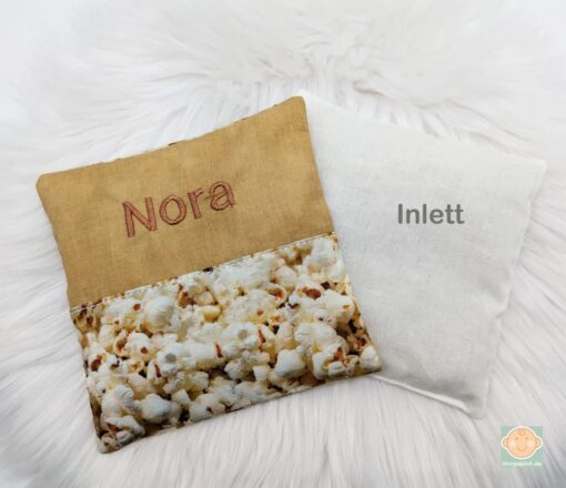 Wärmekissen mit Popcornmuster und Inlett.