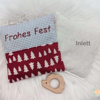 Wärmekissen mit Frohes Fest Schriftzug und Tannenbaum-Muster